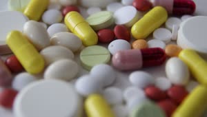 Stock Video Lot Of Pills And Capsules Turning Animated Wallpaper
