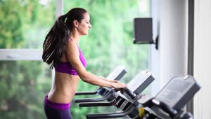 Stock Video Long Haired Sport Woman Running On Treadmill At Gym Animated Wallpaper