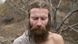 Stock Video Long Beard Man Waking Up From Meditation Animated Wallpaper