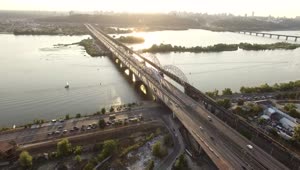 Stock Video Long Bridge With Traffic And A River Animated Wallpaper