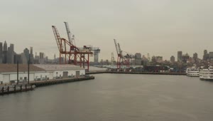 Stock Video Loader Cranes In The Port Seen From The River Animated Wallpaper