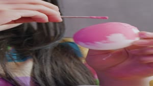 Stock Video Little Kid Painting Easter Eggs Animated Wallpaper