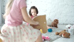 Stock Video Little Girls Playing In The Toy Room Animated Wallpaper