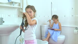 Stock Video Little Girls Doing Makeup In Bathroom Animated Wallpaper