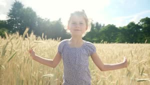 Stock Video Little Girl Walking In The Field During The Summer Animated Wallpaper