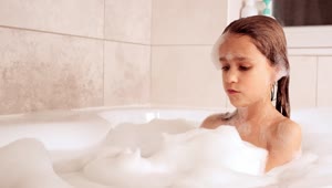 Stock Video Little Girl Taking A Bath In The Tub Animated Wallpaper