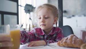 Stock Video Little Girl Refuses Orange Juice For Breakfast Animated Wallpaper