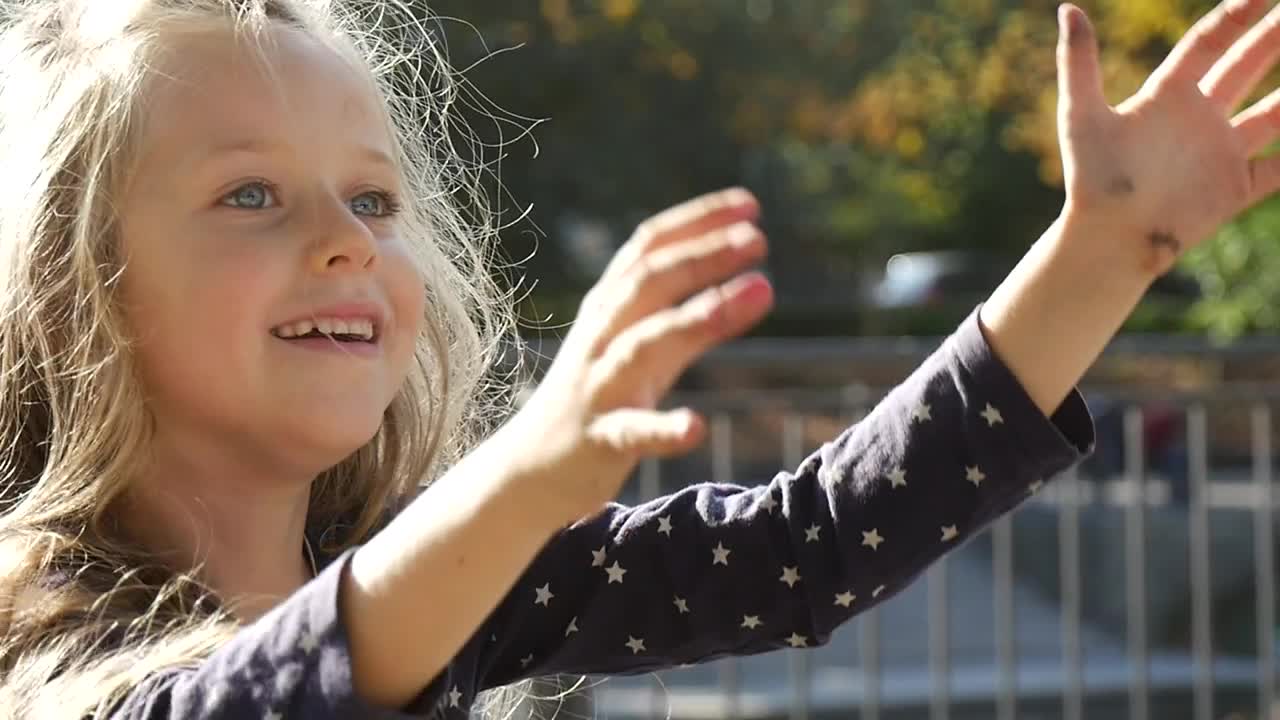 Download Stock Video Little Girl Playing With A Ball Animated Wallpaper