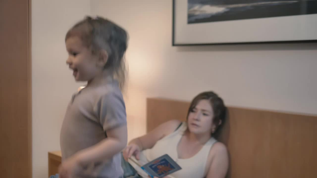 Download Stock Video Little Girl Jumping On The Bed Animated Wallpaper