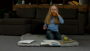 Stock Video Little Girl Doing Her Homework Animated Wallpaper