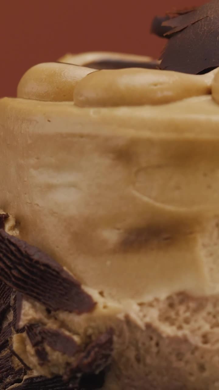 Download Stock Video Little Chocolate Cake Slowly Rotating Animated Wallpaper
