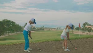 Stock Video Little Brothers Playing Golf Animated Wallpaper