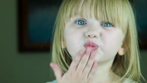 Stock Video Little Blonde Girl Send A Kiss Animated Wallpaper