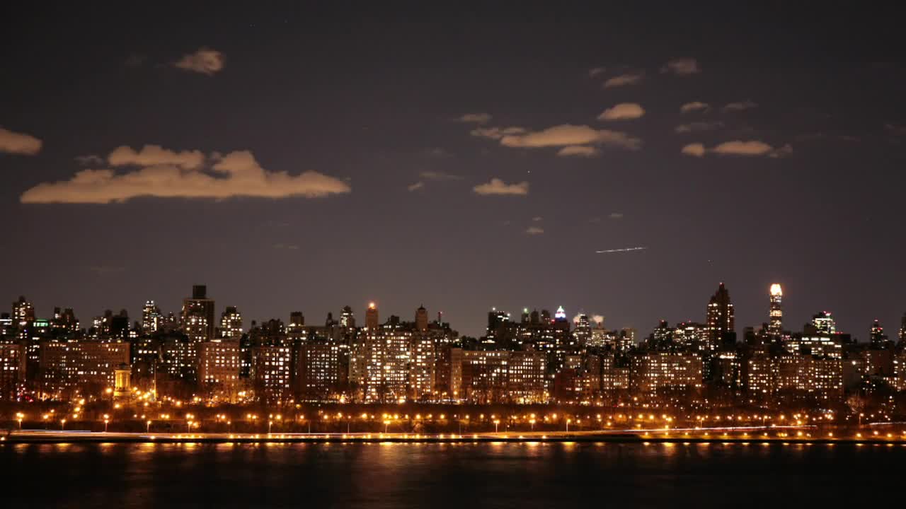 Download Stock Video Lights Across A Night Skyline Animated Wallpaper