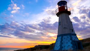 Stock Video Lighthouse At Sunset Animated Wallpaper