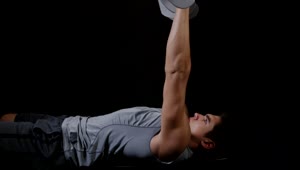 Stock Video Lifting Weights On A Dark Background Animated Wallpaper