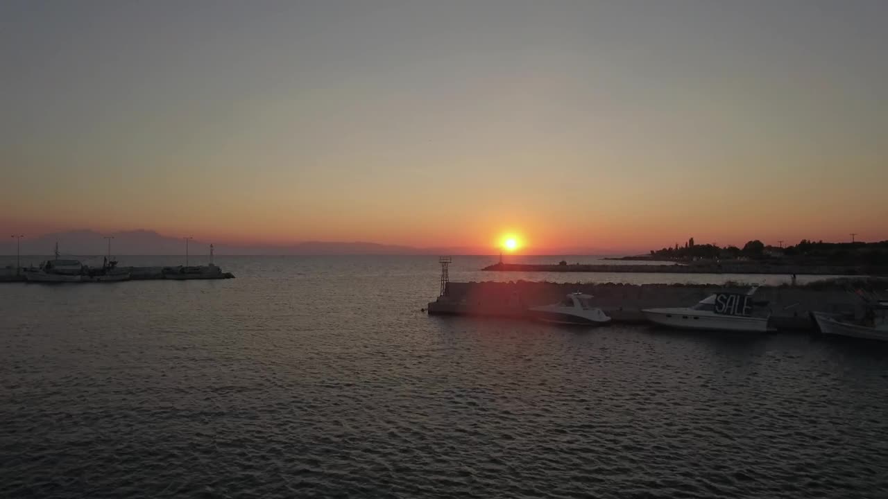 Download Stock Video Leaving The Harbor At Sunset Animated Wallpaper
