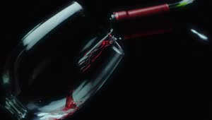 Stock Video Leaning Glass On A Black Background Filled With Red Wine Animated Wallpaper