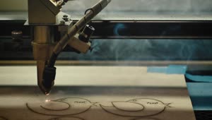Stock Video Laser Cutter Making Figures Animated Wallpaper