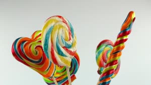 Stock Video Large Rainbow Swirl Lollipops Smal Animated Wallpaper