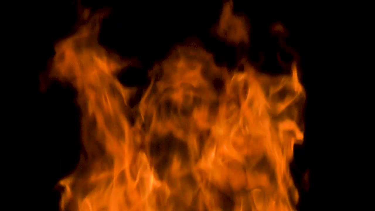 Download Stock Video Large Orange Flames On Black Background Animated Wallpaper