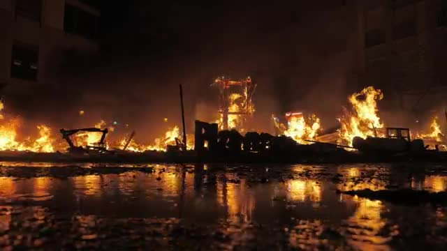 Download Stock Video Large Fire Burning Through The Night Smal Animated Wallpaper