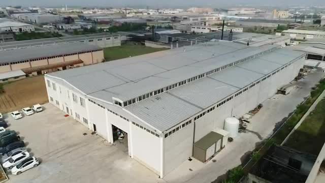 Download Stock Video Large Factory Building Smal Animated Wallpaper