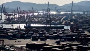 Stock Video Large Container Area On A Shoreline On A Sunny Day Smal Animated Wallpaper
