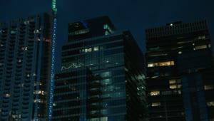 Stock Video Large Buildings Of A City At Dusk Animated Wallpaper