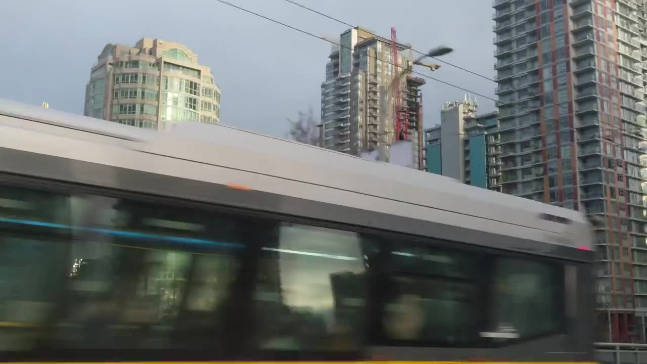 Download Stock Video Large Buildings From The Window Of A Train Animated Wallpaper