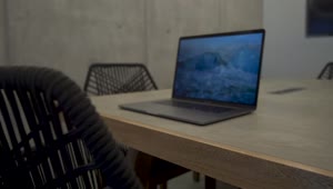 Stock Video Laptop On Wooden Table Animated Wallpaper