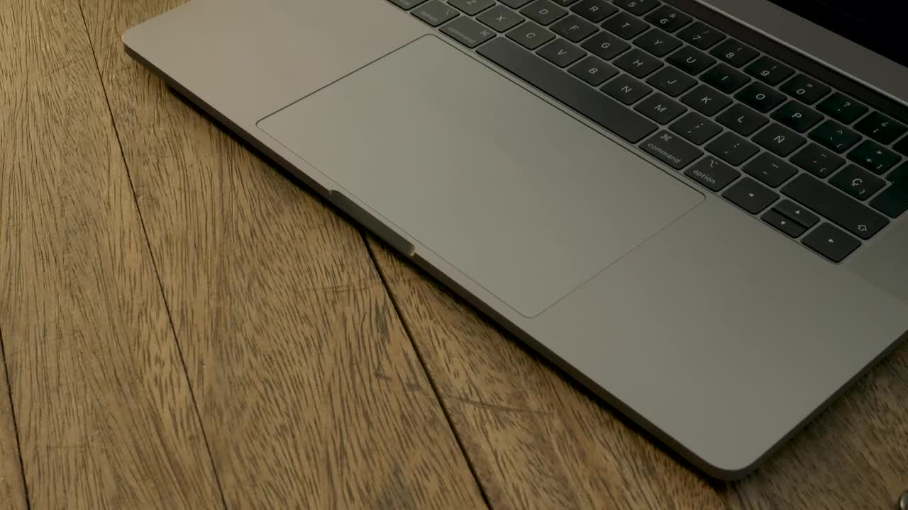 Download Stock Video Laptop On A Table Animated Wallpaper