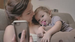 Stock Video Mother Taking A Selfie With Her Little Daughte Animated Wallpaper