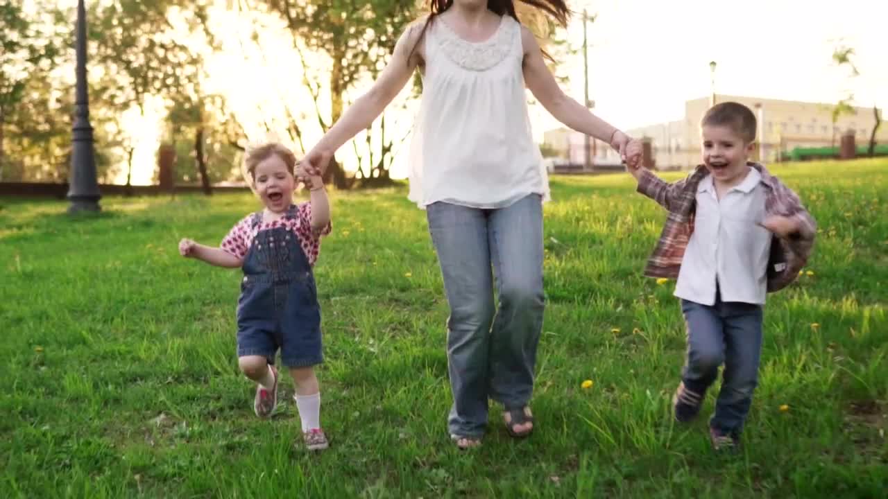 Download Stock Video Mother Running With Her Childre Animated Wallpaper