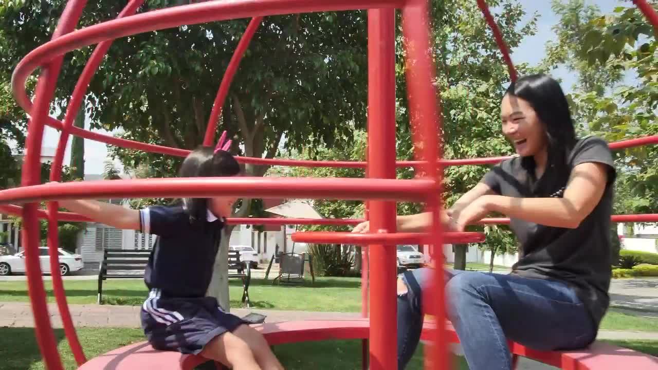 Download Stock Video Mother Playing With Her Daughter In The Par Animated Wallpaper