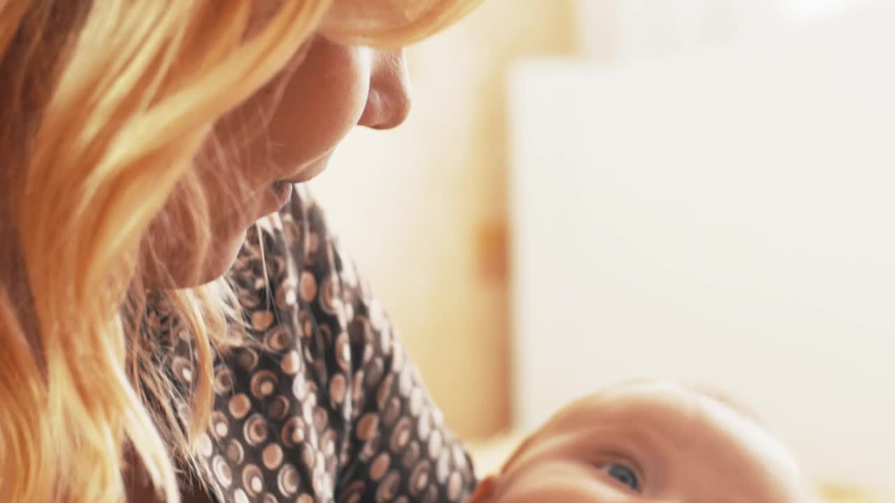 Download Stock Video Mother Holding Her Little Bab Animated Wallpaper