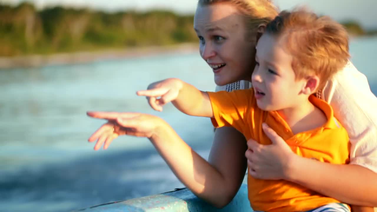 Download Stock Video Mother And Son On A Fast Boa Animated Wallpaper