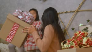 Stock Video Mother And Daughters Opening Presents On Christmas Da Animated Wallpaper