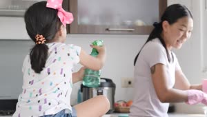Stock Video Mother And Daughter Playing Happily In The Kitche Animated Wallpaper