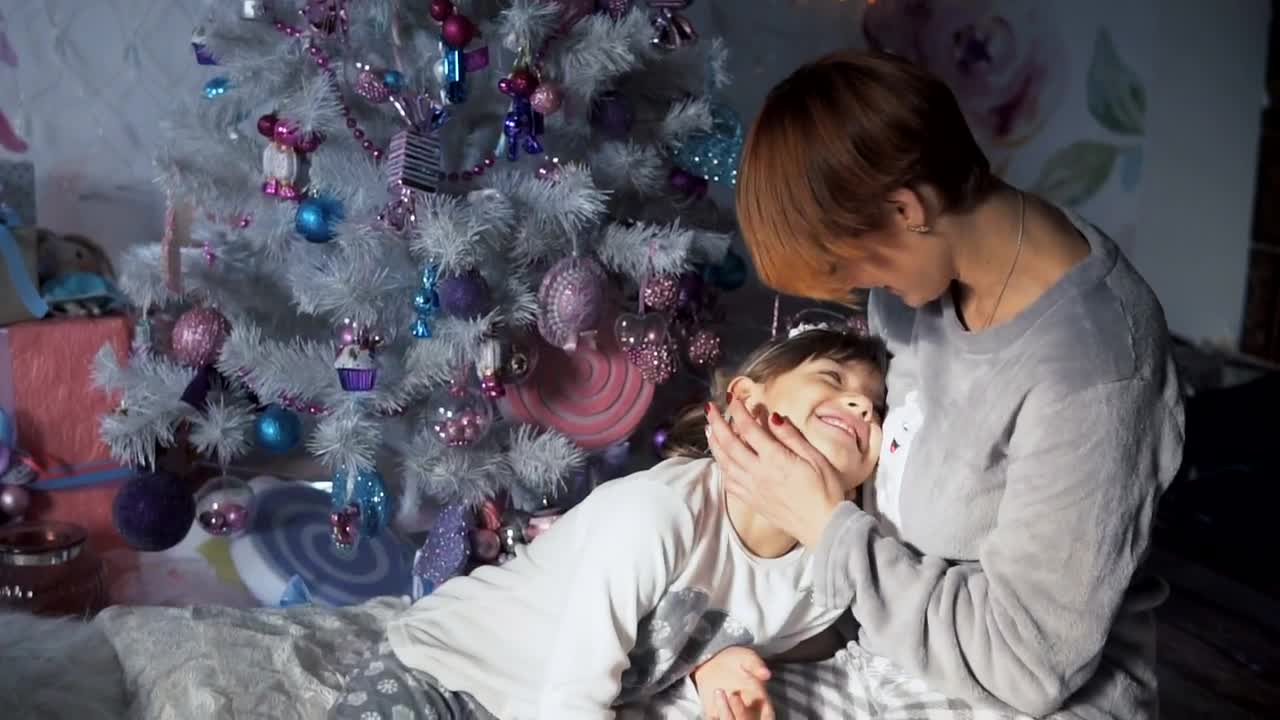 Download Stock Video Mother And Daughter At Christma Animated Wallpaper