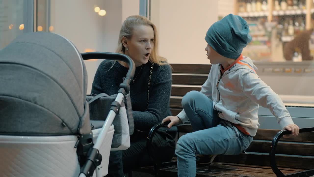 Download Stock Video Mother And Children Outside A Sho Animated Wallpaper