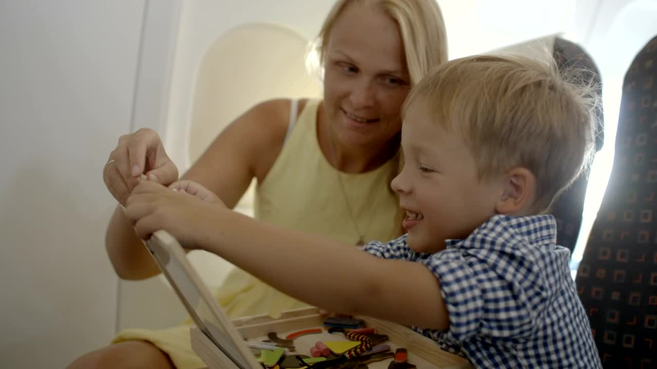 Download Stock Video Mother And Child Flying Away On Vacatio Animated Wallpaper