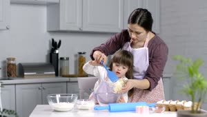 Stock Video Mother And Child Baking In The Kitche Animated Wallpaper