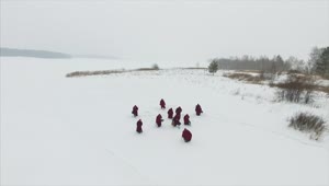 Stock Video Monks Walking Through The Sno Animated Wallpaper