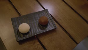 Stock Video Mochi Dessert On A Brown Plat Animated Wallpaper