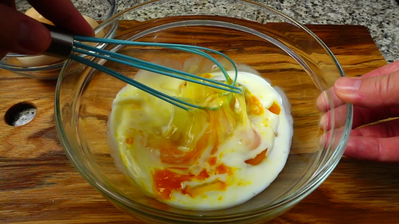 Download Stock Video Mixing Up An Omlett Animated Wallpaper