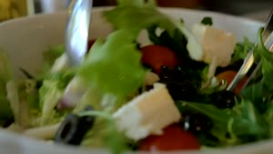 Stock Video Mixing Up A Greek Salad Ready For Servin Animated Wallpaper