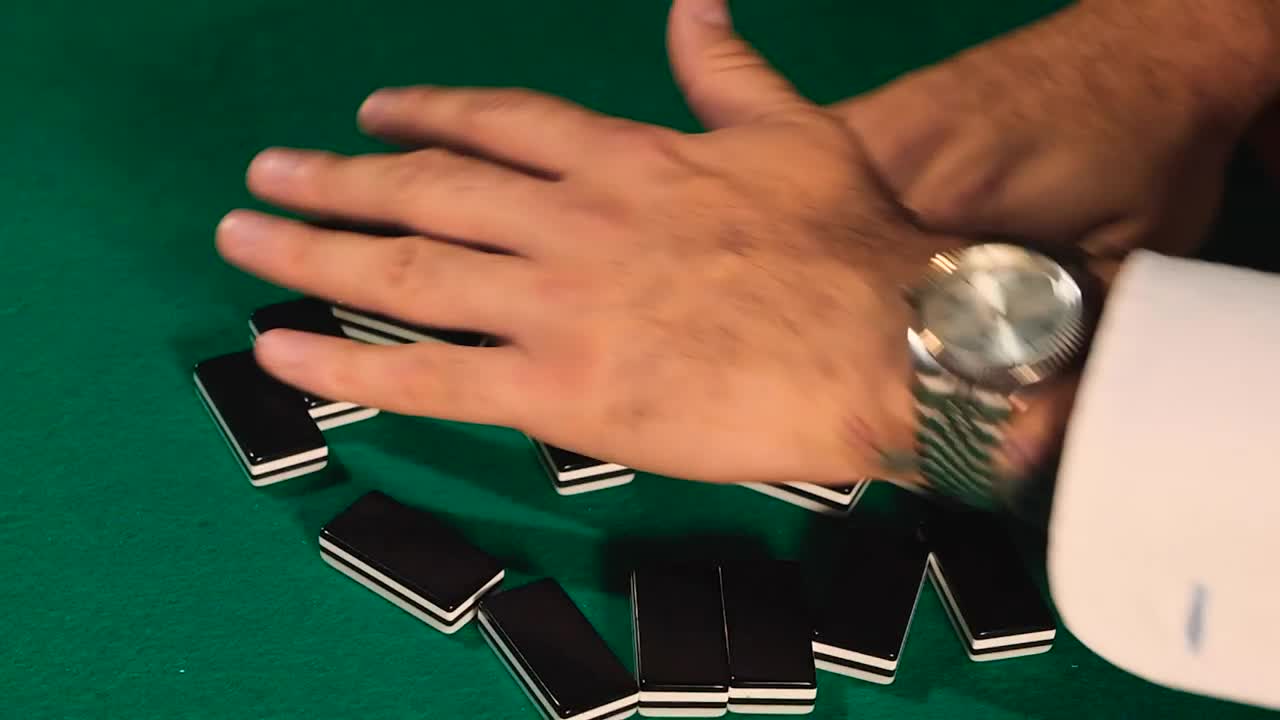 Download Stock Video Mixing Dominoes On A Gaming Tabl Animated Wallpaper