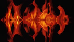 Stock Video Mirror Effect Of Flames Burning On A Black Backgroun Animated Wallpaper