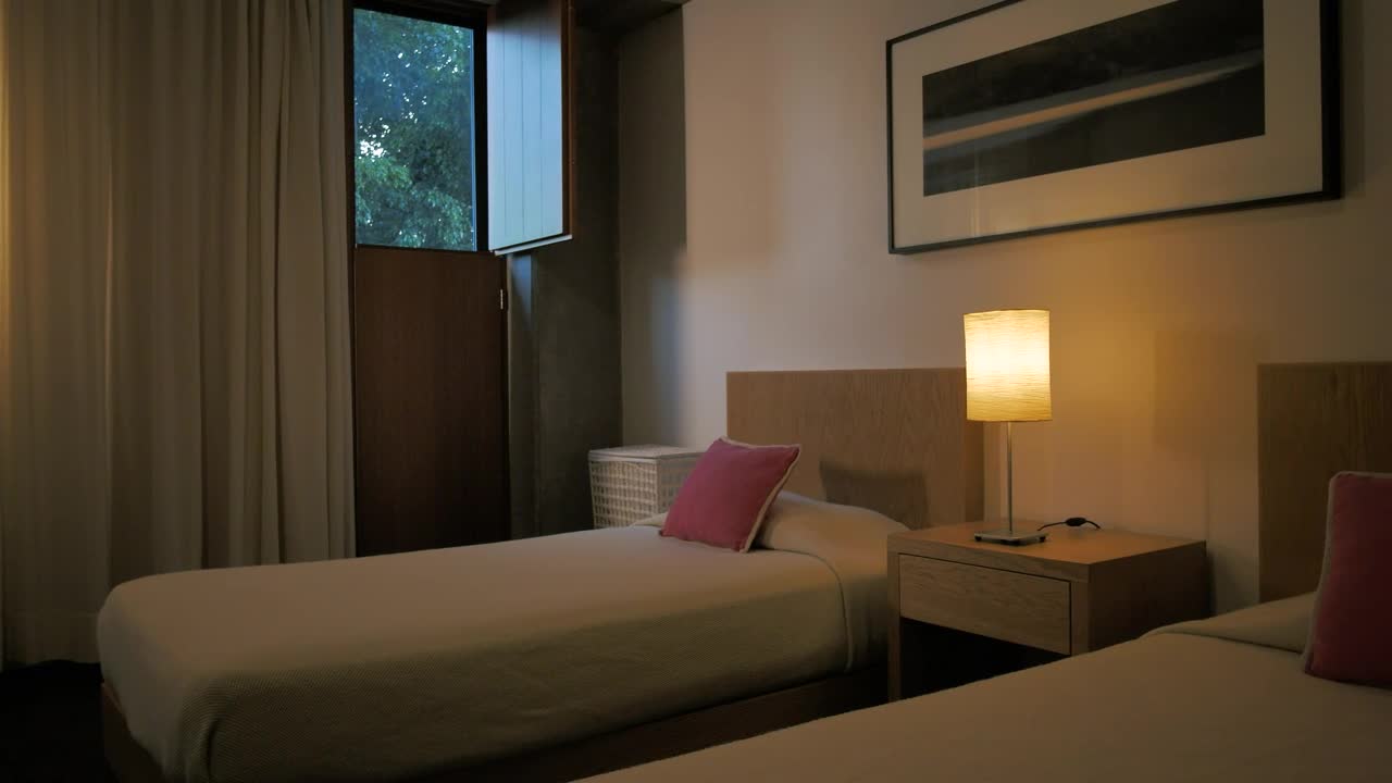 Download Stock Video Minimalist Room With A Couple Of Bed Animated Wallpaper